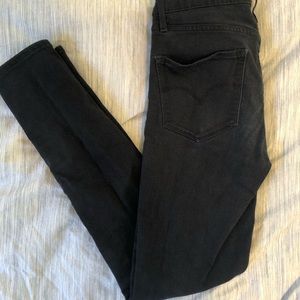 721 Levi black skinny jeans